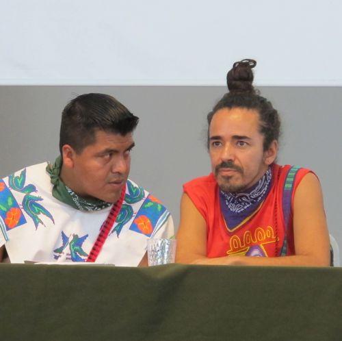 Wixarika leader Santos de la Cruz consults with Ruben Albarran of Café Tacvba in a May 2012 press conference right before Wirikuta Fest. Photo ©Tracy Barnett