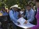 Miguel Vázquez Torres, left, goes over a map of the territory to be restituted on Sept. 22, 2016, with Wixárika attorney Santos de la Cruz Carrillo. Photo: Abraham Pérez.