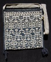 Indigo and white woven wool shoulder bag.