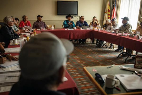 Frank Dayish (wearing black cowboy hat), who grew up on the Navajo reservation, leads one of the Peyote Way of Life Coalition’s meetings in Window Rock, Arizona. Photograph ©Sharon Chischilly/The Guardian