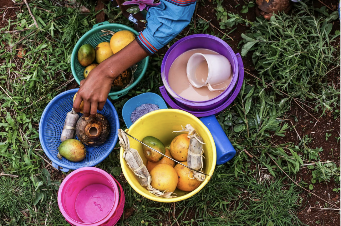 Guardians of the Nawa Women from each family prepare and care for nawa, a sacred maize drink, during Semana Santa. It is offered to the community on Holy Sunday. Photograph by Luis Martínez